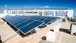 Commercial rooftop solar engineering 2025, Ballasted vs. penetrated mounting systems, ASCE 7-22 wind load standards, Commercial solar installation challenges